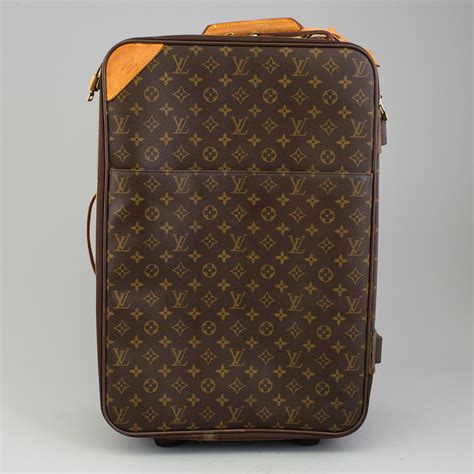 louis vuitton carry on travel bag|Louis Vuitton suitcase with wheels.